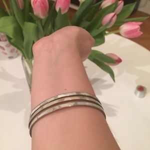 Three pearl bangles